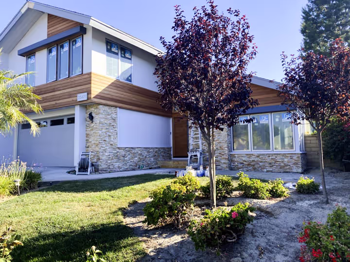 Residential Home Renovation Siding Windows Landscape — photo 1